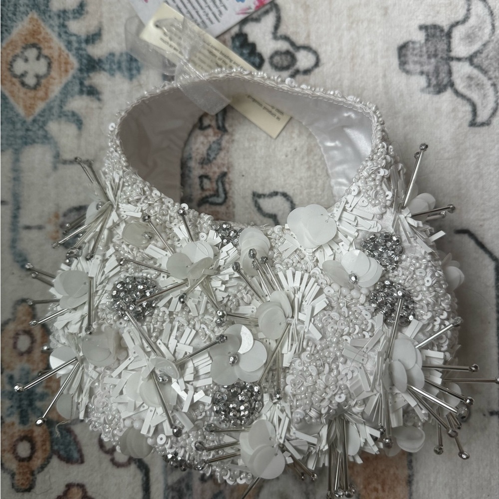 White and silver beaded white bag